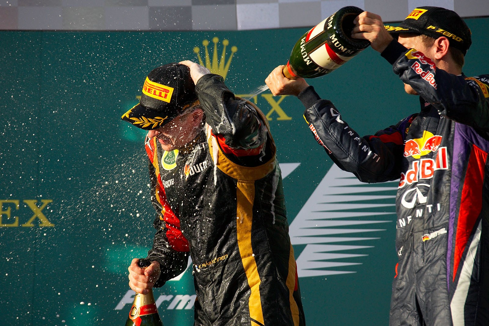 Champagne shower after the ceremony for the race winner Kimi Raikkonen
