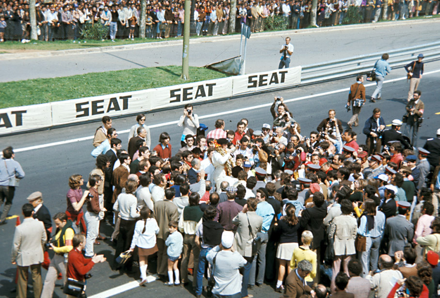 Race winner Jackie Stewart celebrates his victory