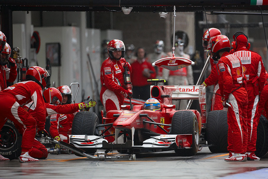 Fernando Alonso is urged to do a longer stop at Ferrari and falls back to third race position because the front right wheel nut refuses to stay in place