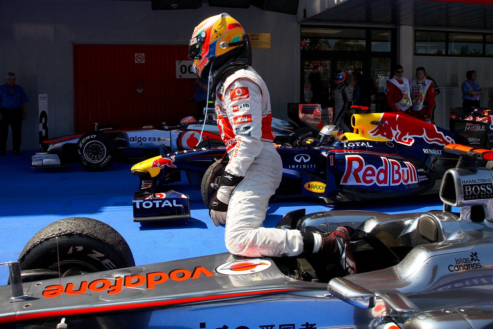 Lewis Hamilton, McLaren-Mercedes, exits his car in parc ferme.