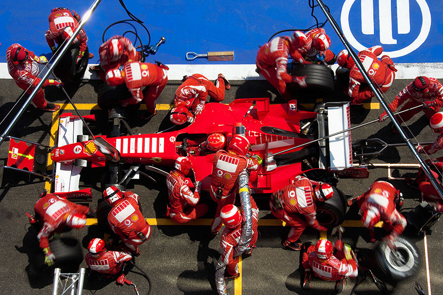 Michael Schumacher during his first pit stop in lap 18