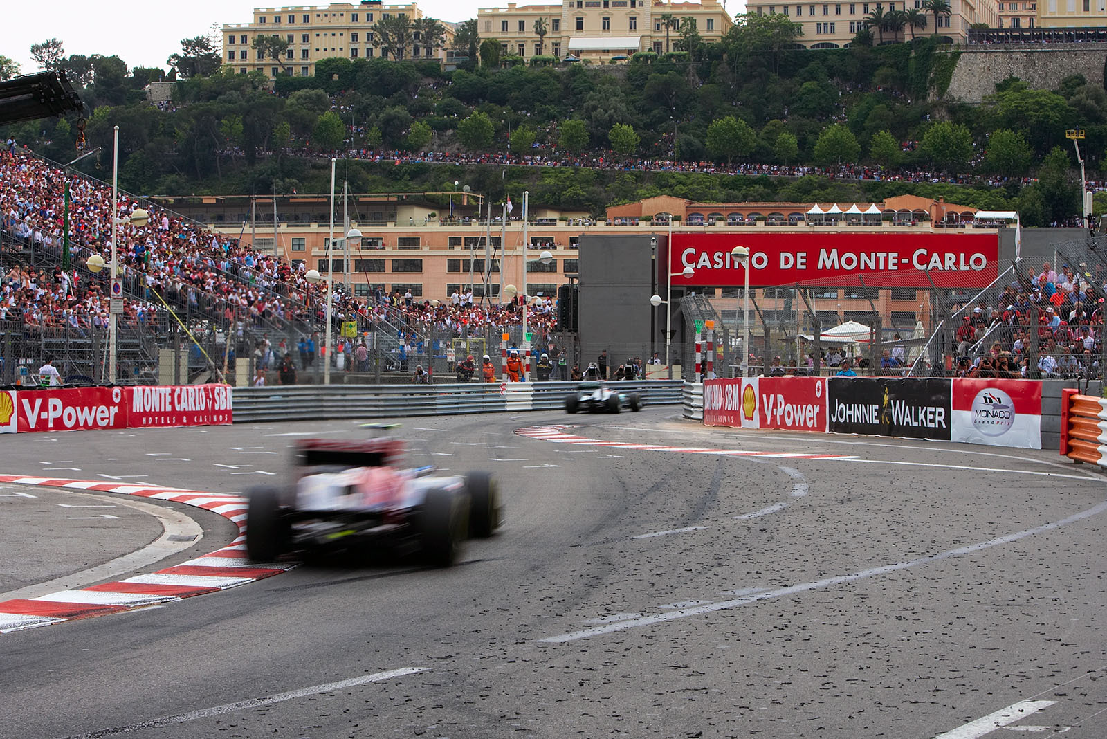 Tyre rubber 'marbles' pollute the track besides the racing line at Piscine