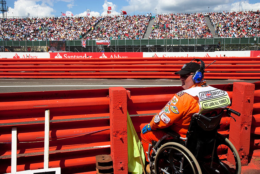 A devoted marshal watches the action