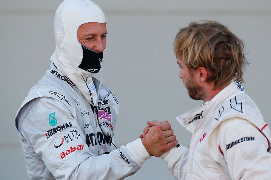 Handshake after the race between the German rivals Michael Schumacher (Mercedes GP, 6th) and Nick Heidfeld (Sauber, 8th)
