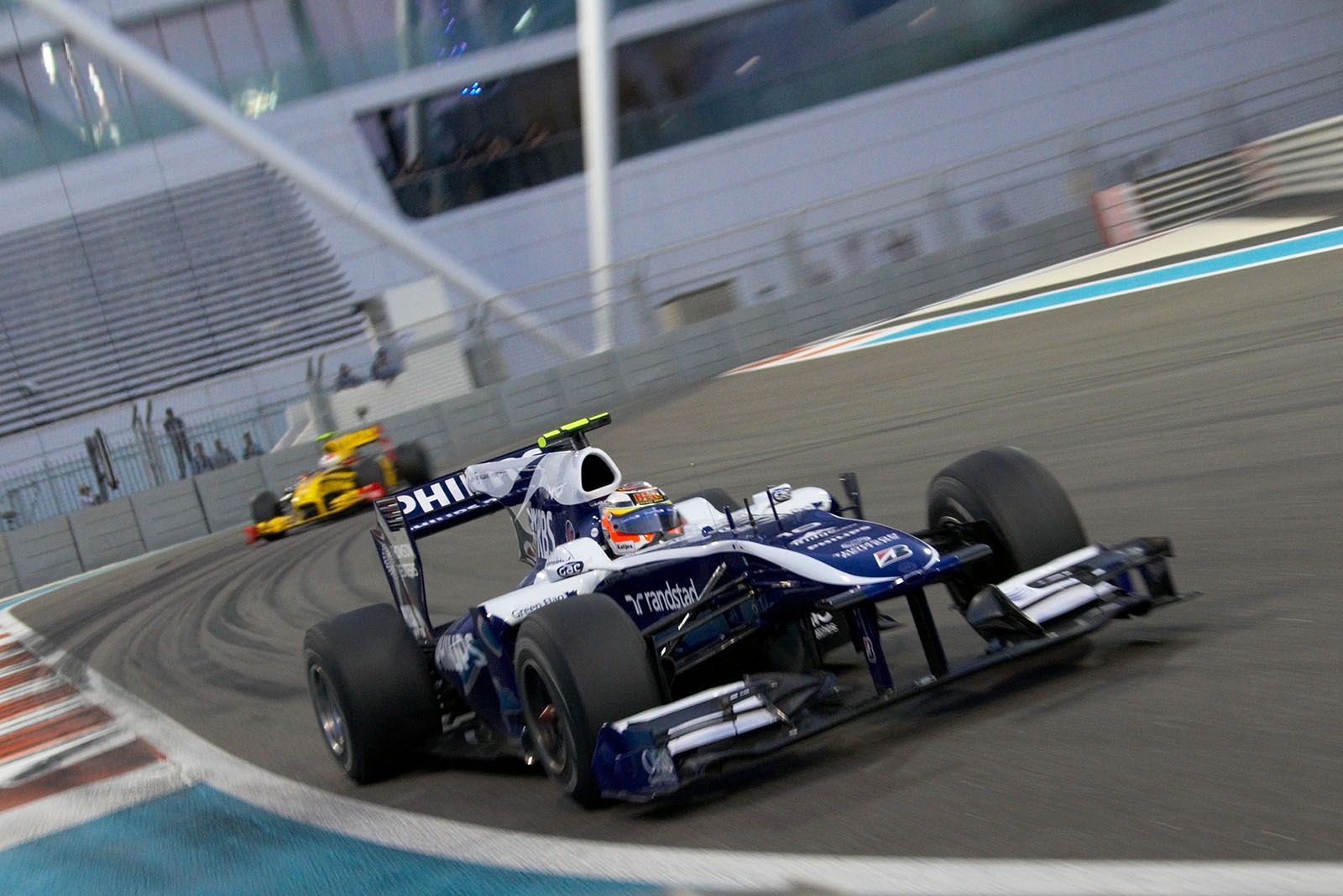 The chasers are Nico Hulkenberg, Williams, in front of Renault's Petrov ...