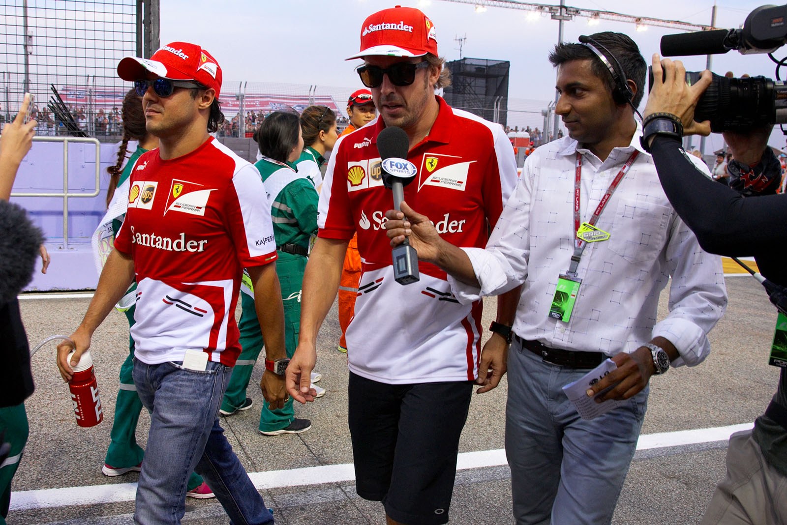 Ferrari drivers Felipe Massa and Fernando Alonso after the drivers parade