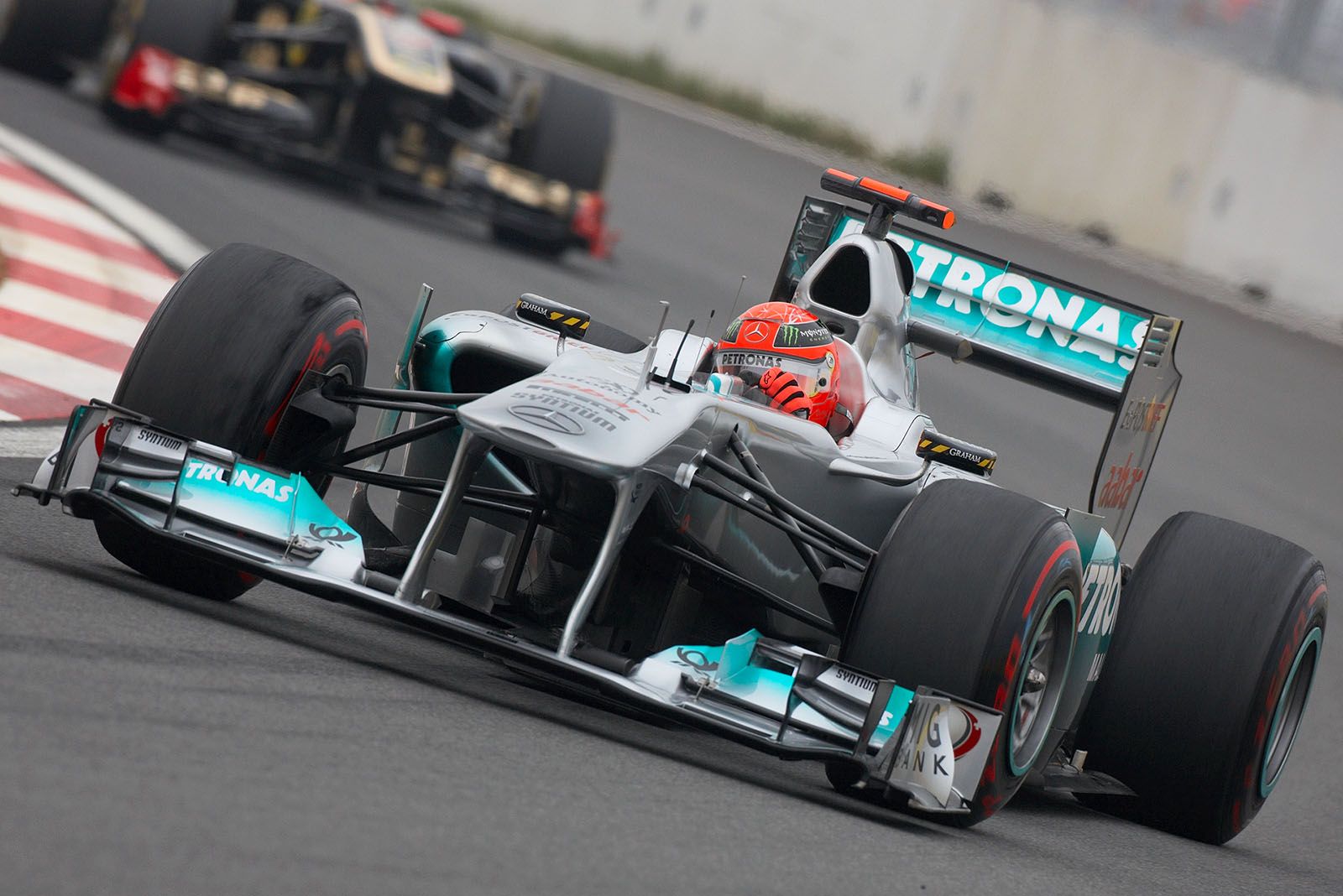 Michael Schumacher, Mercedes GP, in front of a Renault car