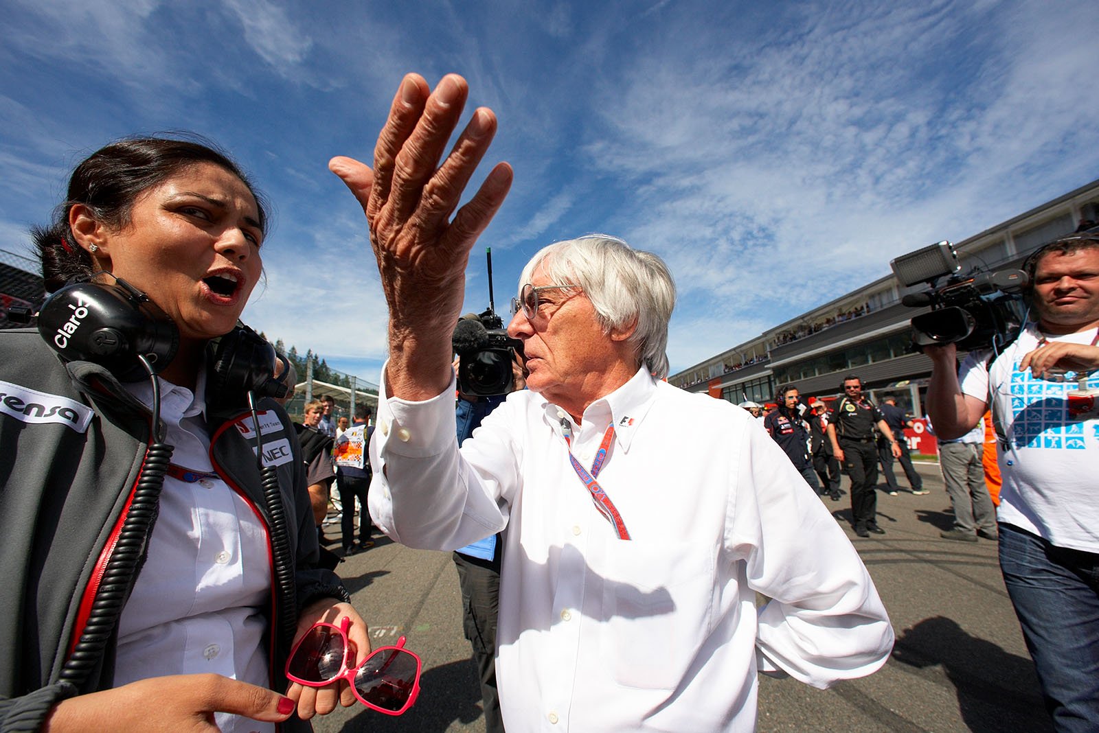 Bernie Ecclestone visits Sauber's team principal Monisha Kaltenborn on the first row of the grid before the race
