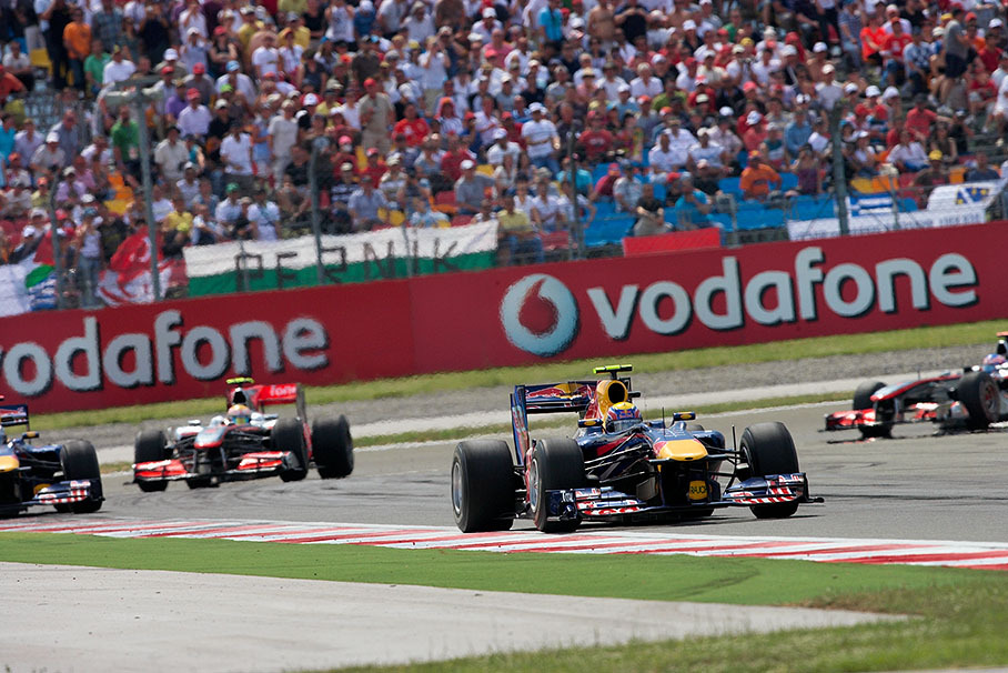 The leading group of the the two pairs who swiftly increase the distance from the rest of the field, two Red Bull cars with Webber in the lead and both McLarens close behind