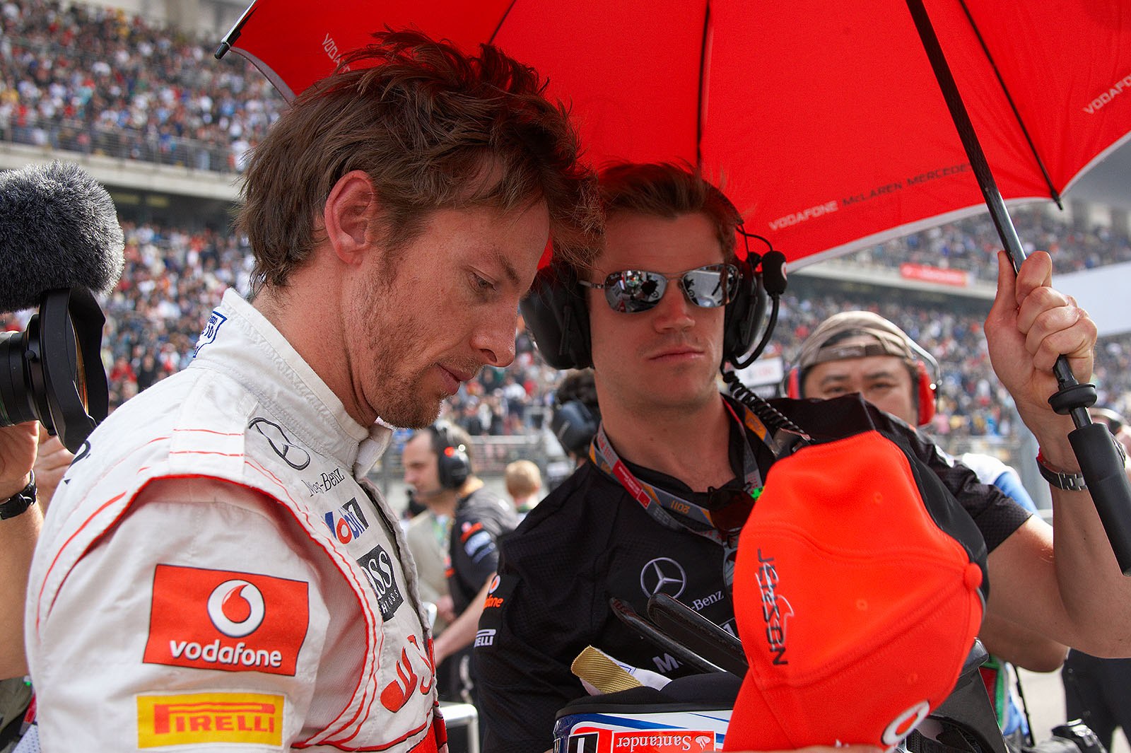 McLaren's Jenson Button prepares for racing at second grid position