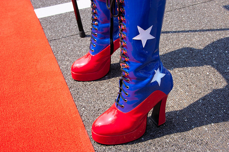 Colorful marching boots of an American grid girl