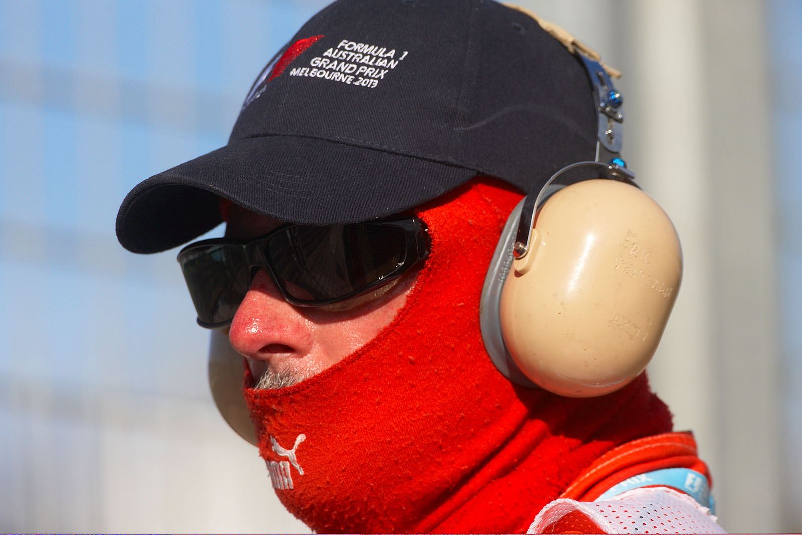 A red-nosed pitlane marshal