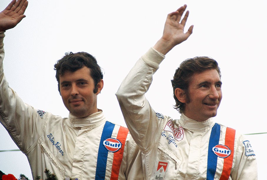 The winning Porsche driver team on podium of the 1000 km Spa 1970: Brian Redman (GB) and Jo Siffert (CH) on Porsche 917K #0014 entered by John Wyer Automotive Engineering