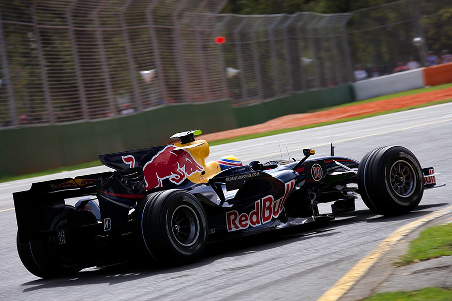 Red Bull driver Mark Webber turns to first corner