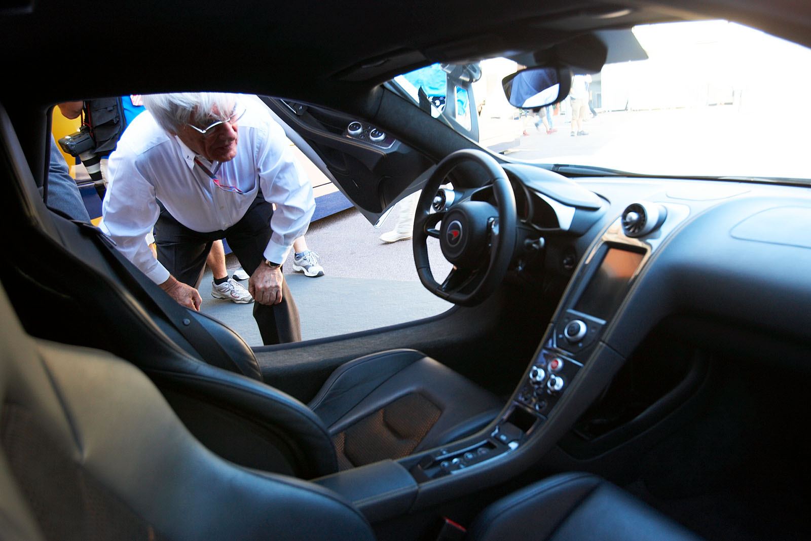 Bernie Ecclestone checking the new McLaren road car (MP4-12C).