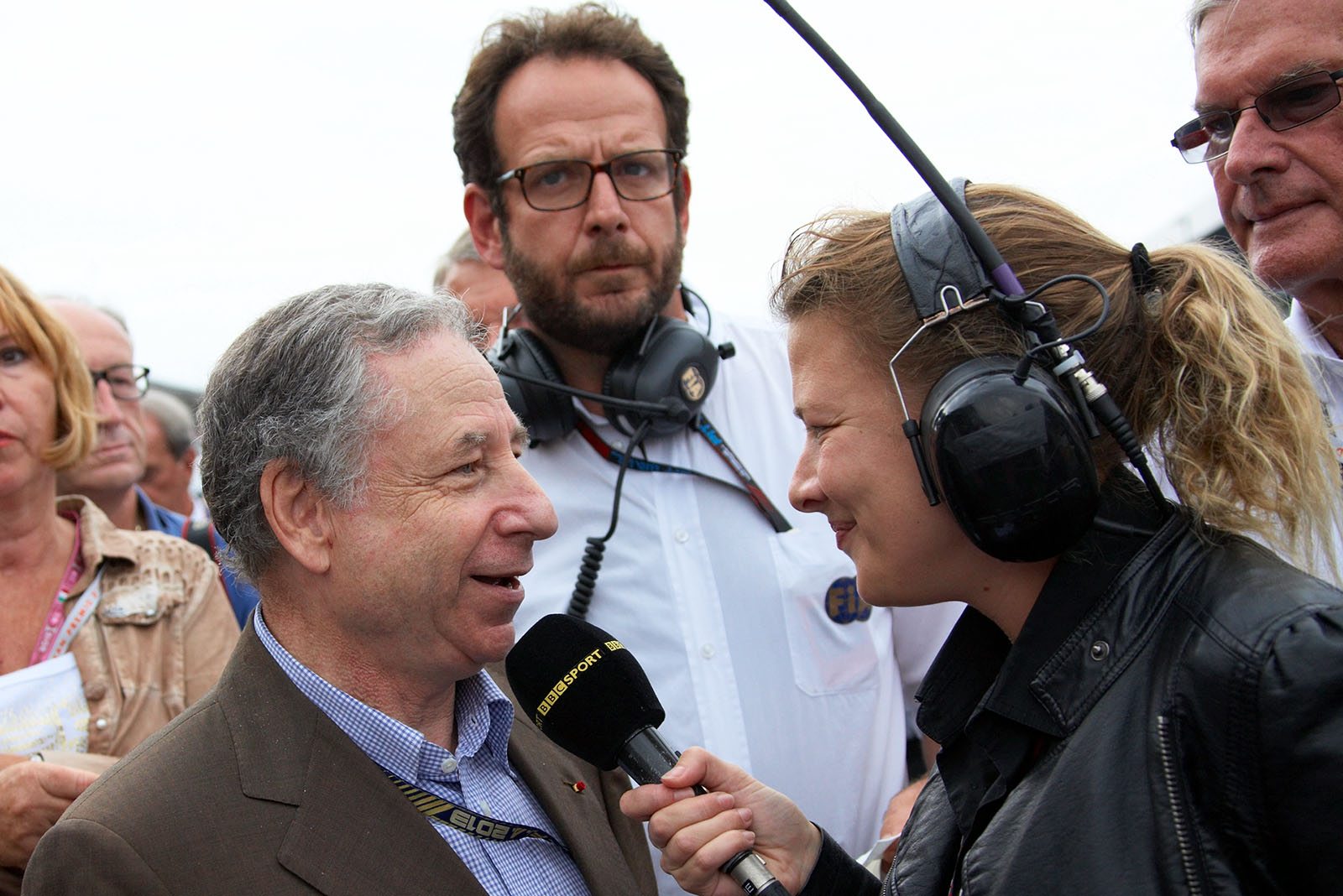 FIA President Jean Todt gives an interview at the grid before the race