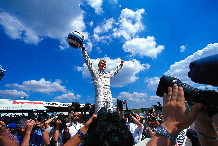 Mika Hakkinen celebrates his victory, Hungarian GP Budapest 1999