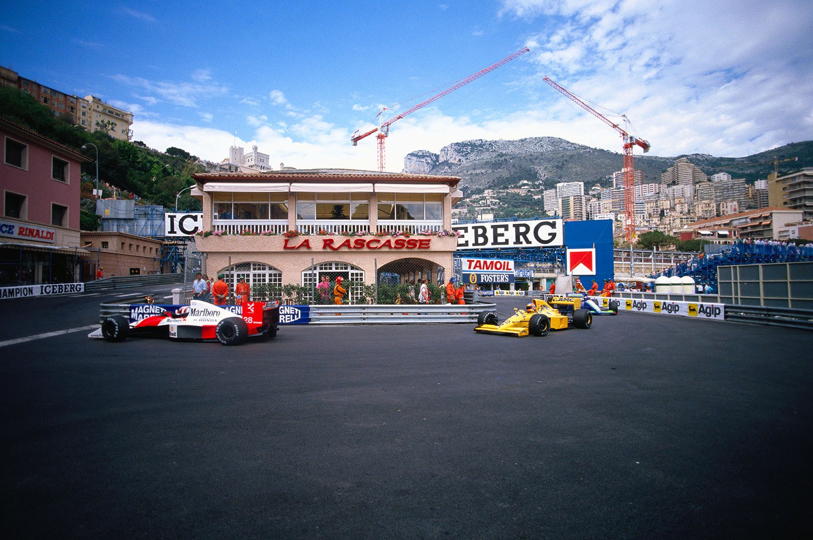 Gerhard Berger, driving his McLaren-Honda trough La Rascasse followed by Donnelly's Lotus, and Foitek in the Onyx. Monaco Grand Prix, 1990