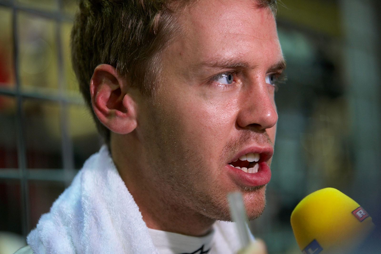 Sebastian Vettel, Red Bull Racing, gives an interview to German RTL TV's Kai Ebel shortly before the race