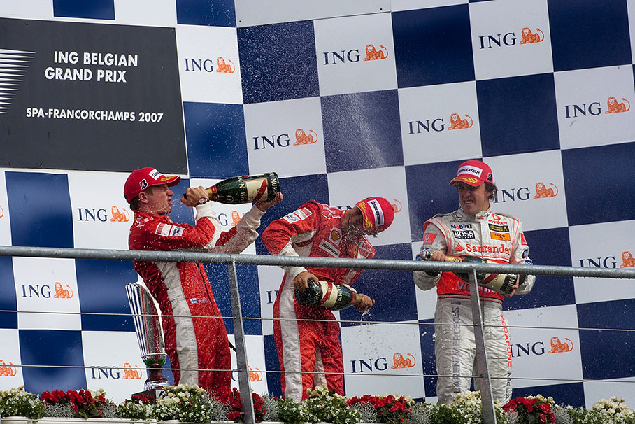Winner Kimi Raikkonen on podium with the second placed Felipe Massa and the third Fernando Alonso.