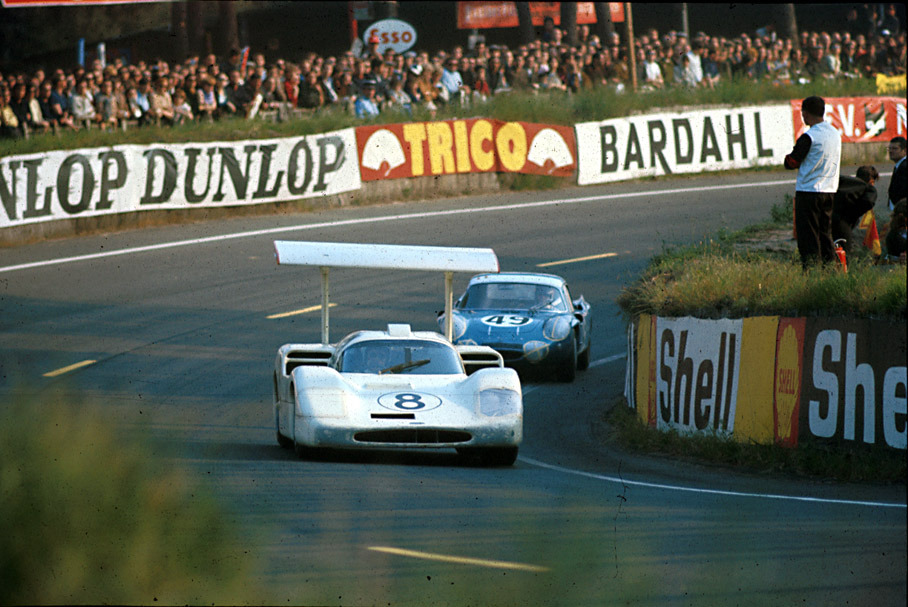 Car no. 8 	Ford Mk II XGT-1 driven by John Whitmore (GB) and Frank Gardner (AUS) in front of Paddy Hopkirk's (GB) and Andrew Hedges' (GB) Austin-Healey Sprite HAN 8R 143