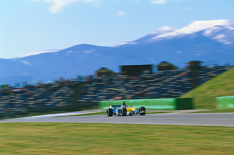 Jarno Trulli with a typical A1-Ring scenery behind