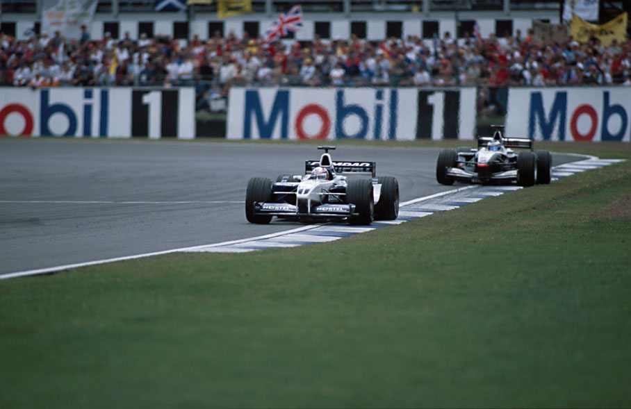 Montoya leading Hakkinen