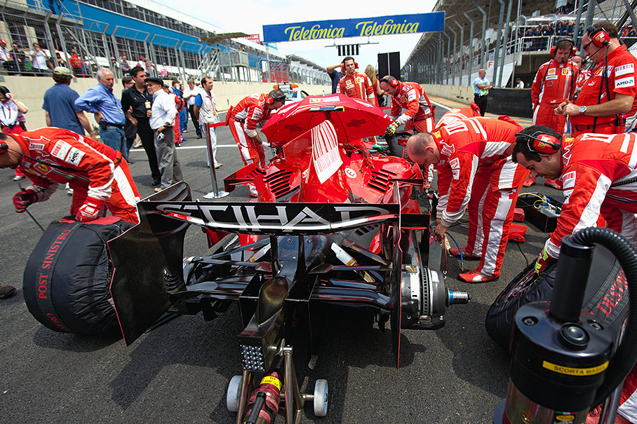 Massa's Ferrari on pole position is being prepared for the important race