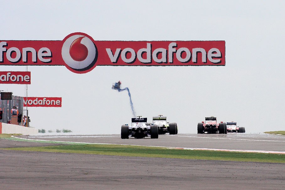 Race cars at Copse corner exit