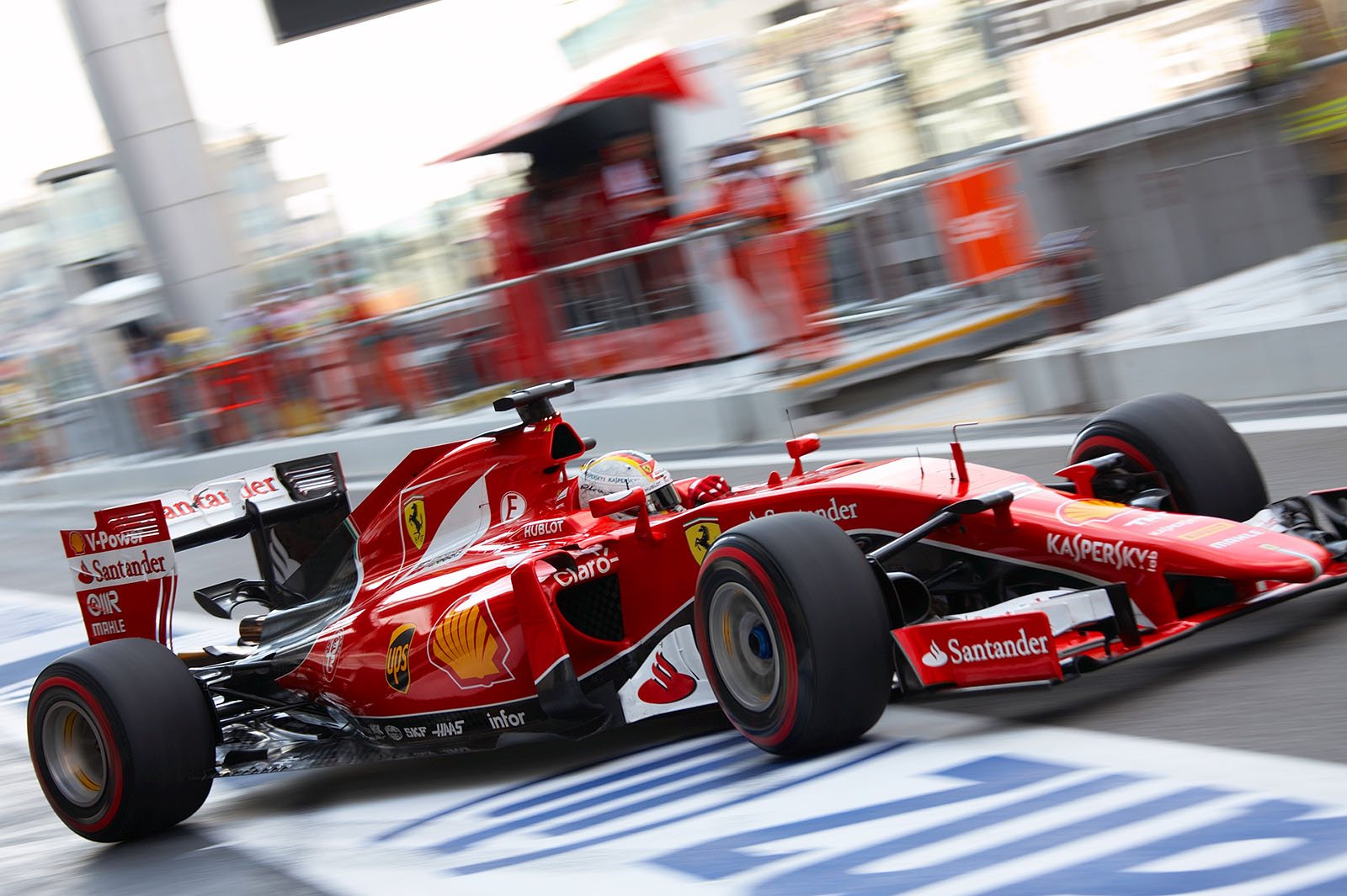 Sebastian Vettel, Ferrari, drives out of the pits, Abu Dhabi Grand Prix, 2015