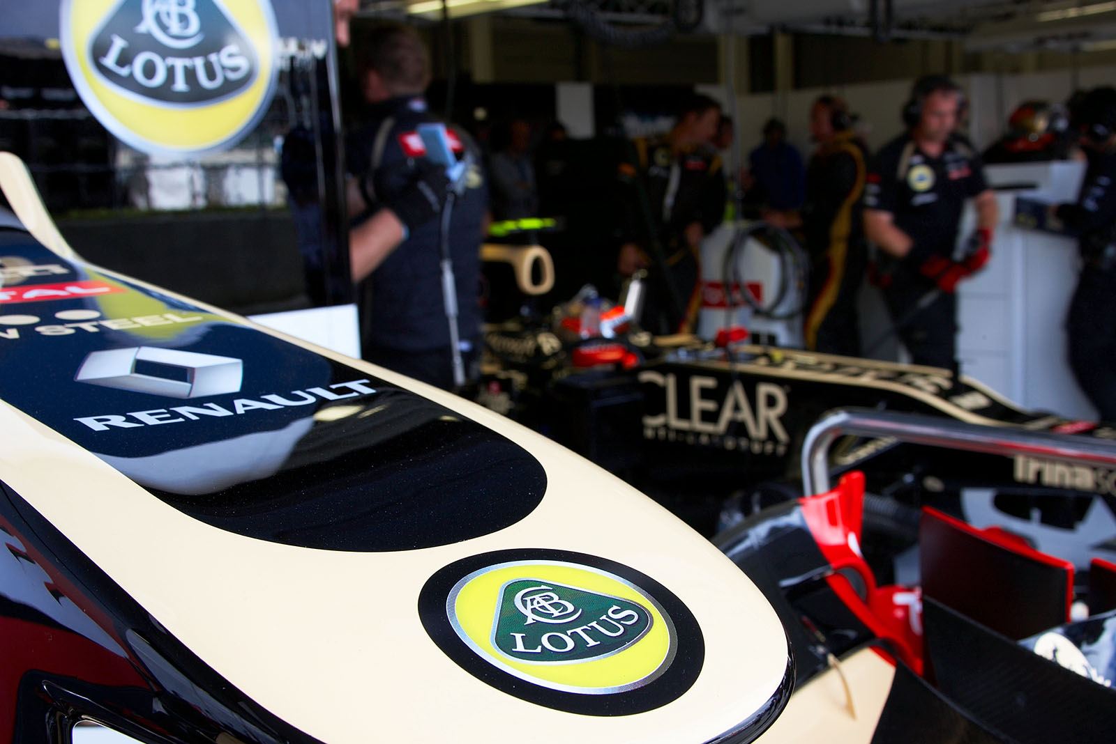 Lotus Renault pits (with Romain Grosjean in the car at the back)