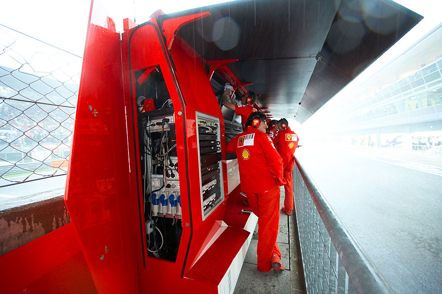 Heavy rain embraces Ferrari pit wall command center