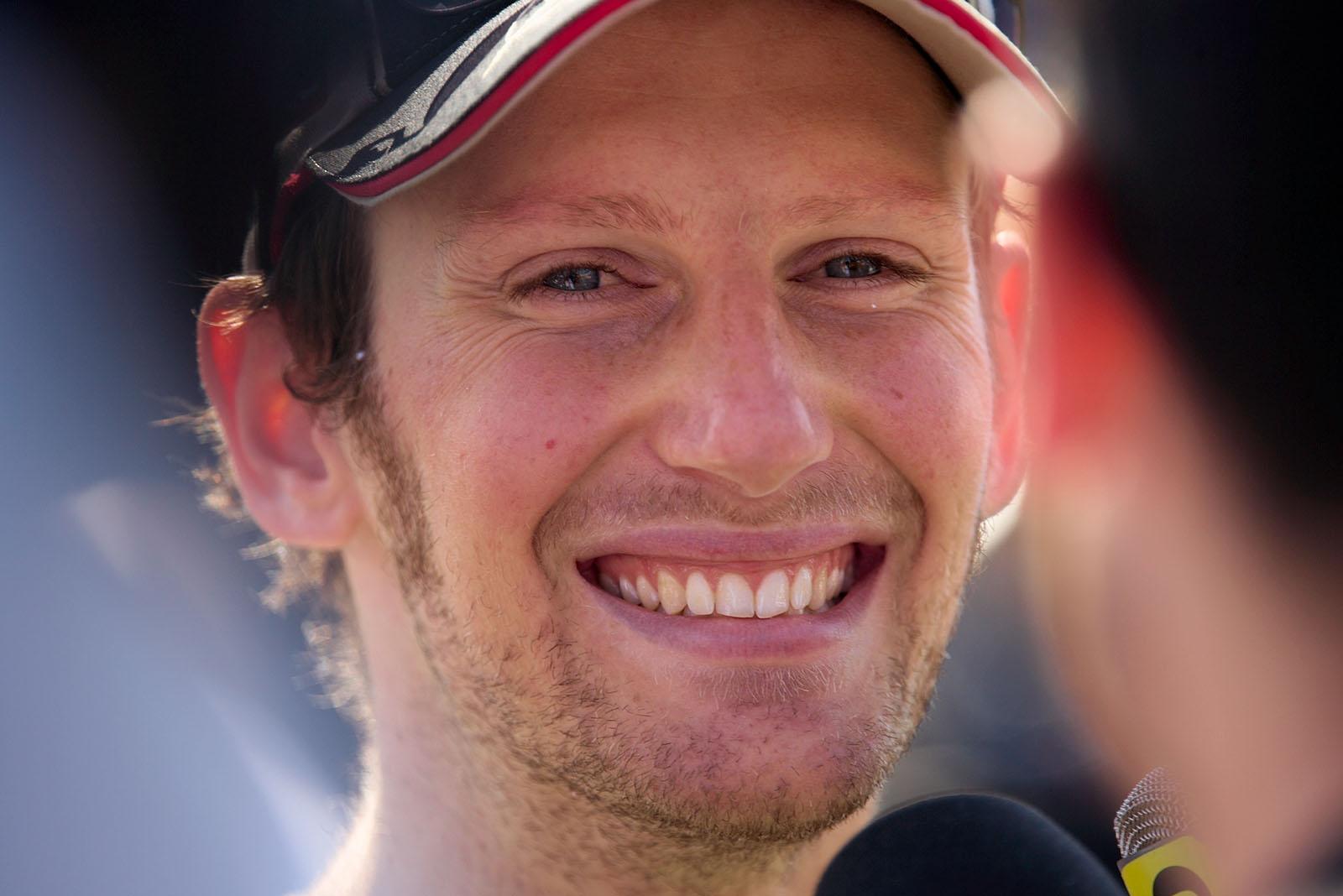 Happy second qualifier Romain Grosjean, Lotus F1 team, smiles after gaining a front row position at qualifying for tomorrow's race
