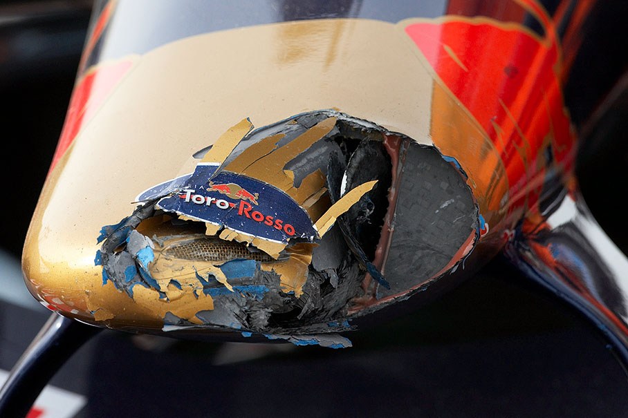 Vettel broke his cars nose during two collisions in first lap