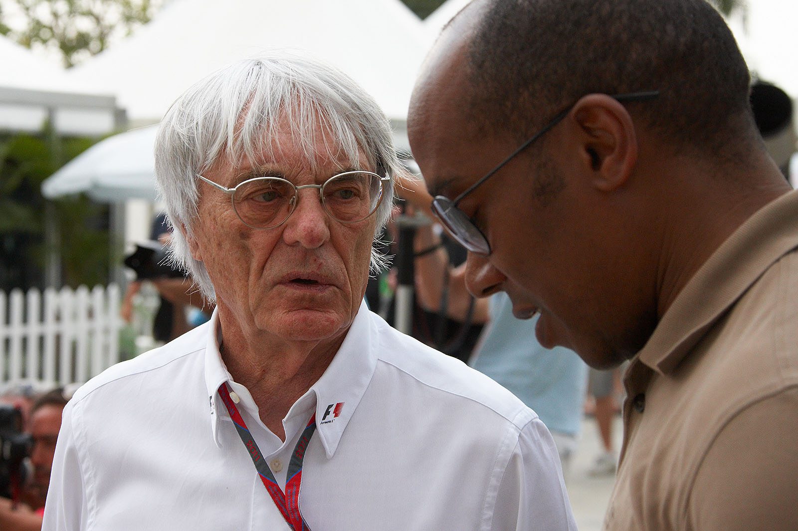 Bernie Ecclestone talks with Anthony Hamilton