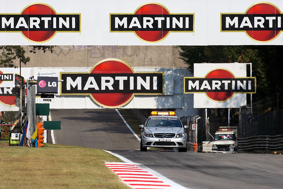 The FIA's medical car does the track check at Ascari chicane entrance