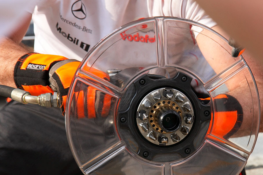 A McLaren airgun with attached flange for wheel hub cap