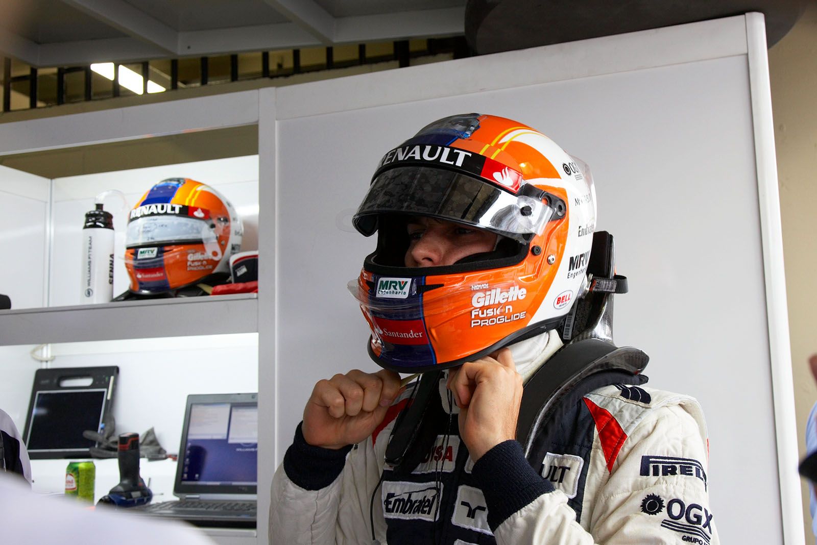 Bruno Senna, Williams F1 Team, puts his helmet on in pits