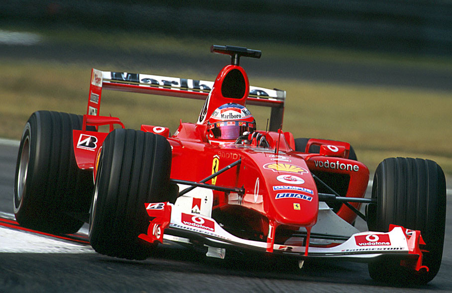 Rubens Barrichello exiting seconda variante on his qualifying lap