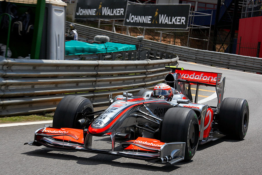 Heikki Kovalainen's McLaren-Mercedes at pitlane exit