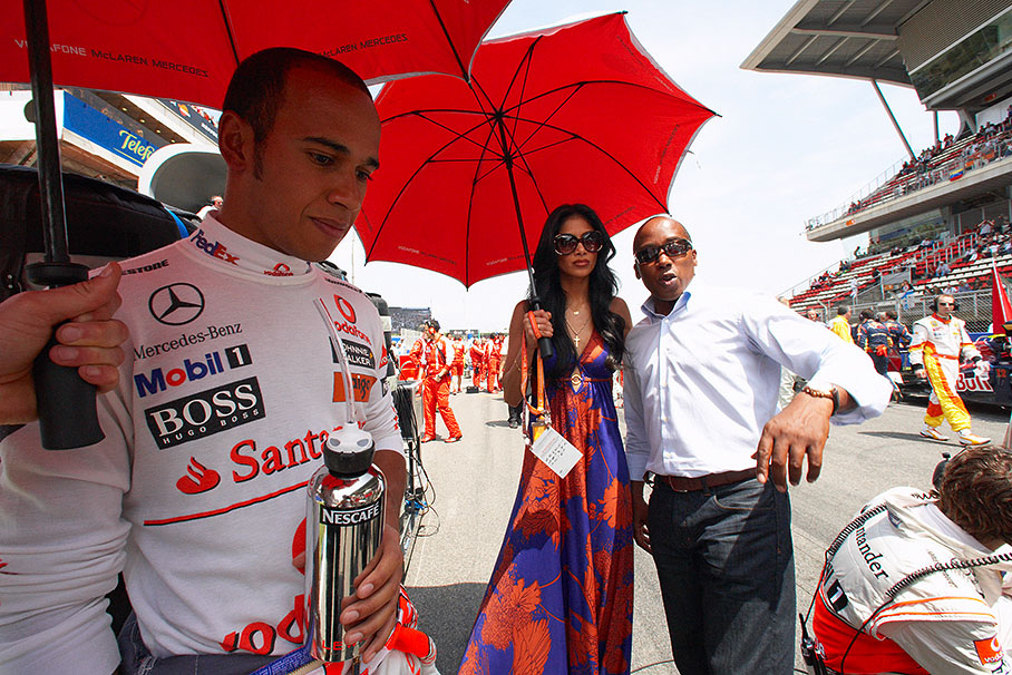 Lewis Hamilton on the grid with his father Anthony and singer Nicole Scherzinger