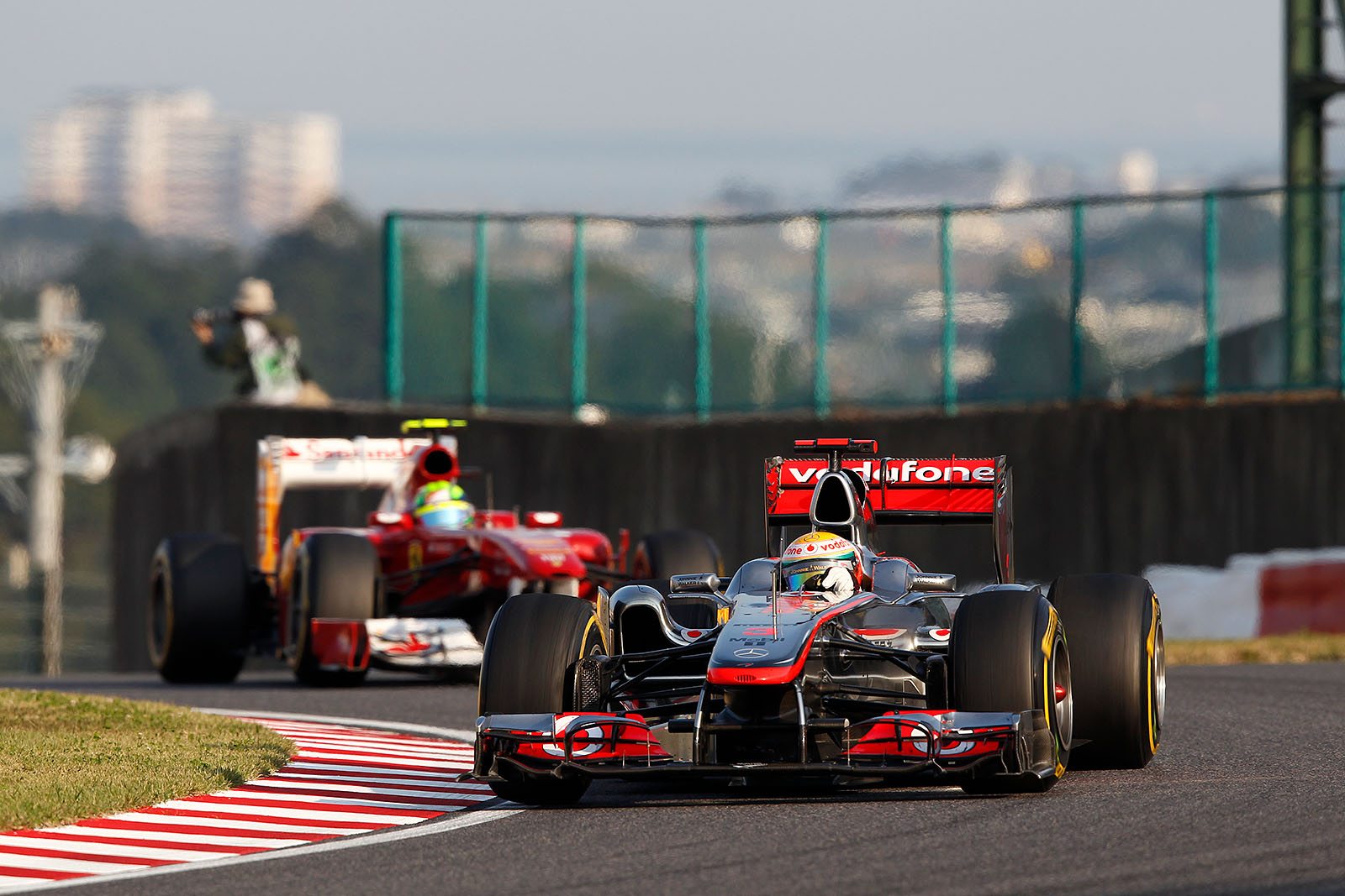 Lewis Hamilton, McLaren Mercedes, in front of a competitive Massa of Ferrari