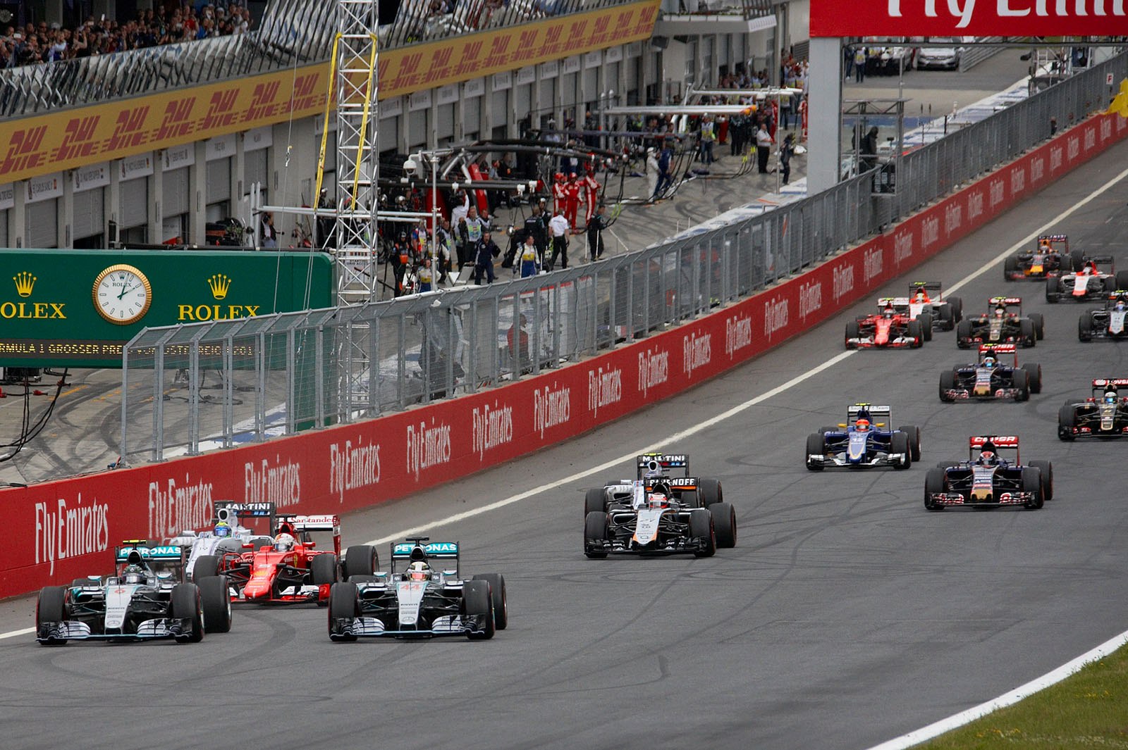 Nico Rosberg dives through on the inside to take the lead, Spielberg, Austrian Grand Prix, 2015
