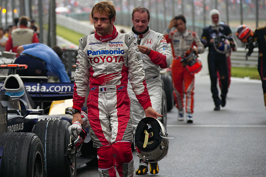 After the race exhausted drivers walk back from scrutineer parking