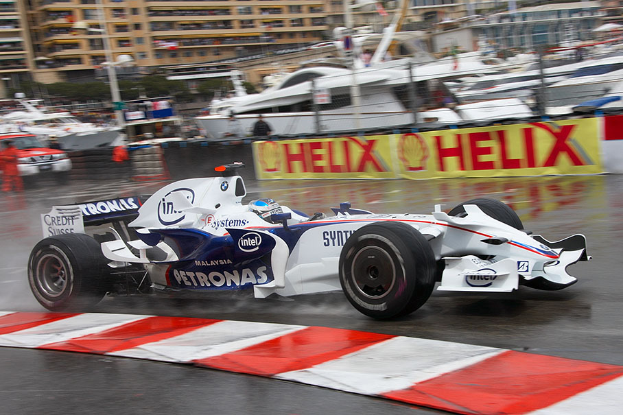 BMW Sauber driver Nick Heidfeld at the flat Piscine curbs