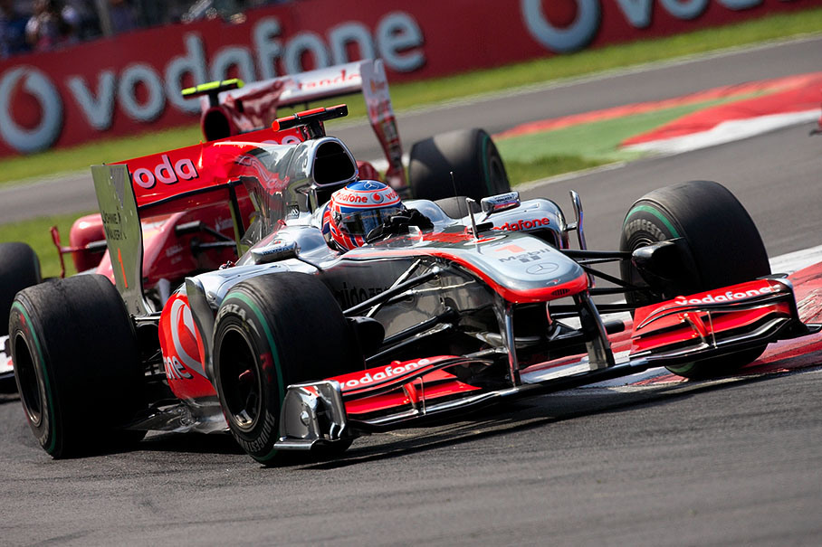 Jenson Button, McLaren Mercedes, in front of Alonso's Ferrari