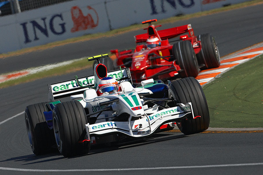 Rubens Barrichello keeps his Honda for a while in front of Raikkonen's catching up Ferrari