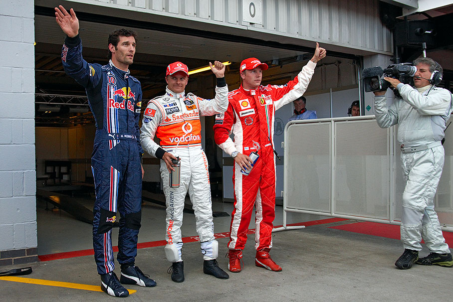 Surprising second grid positioned Mark Webber, polesitter Heikki Kovalainen and third grid placed Kimi Raikkonen give thumbs up for the international media