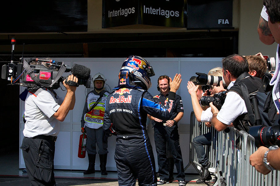 Race winner Sebastian Vettel celebrates in parc ferme