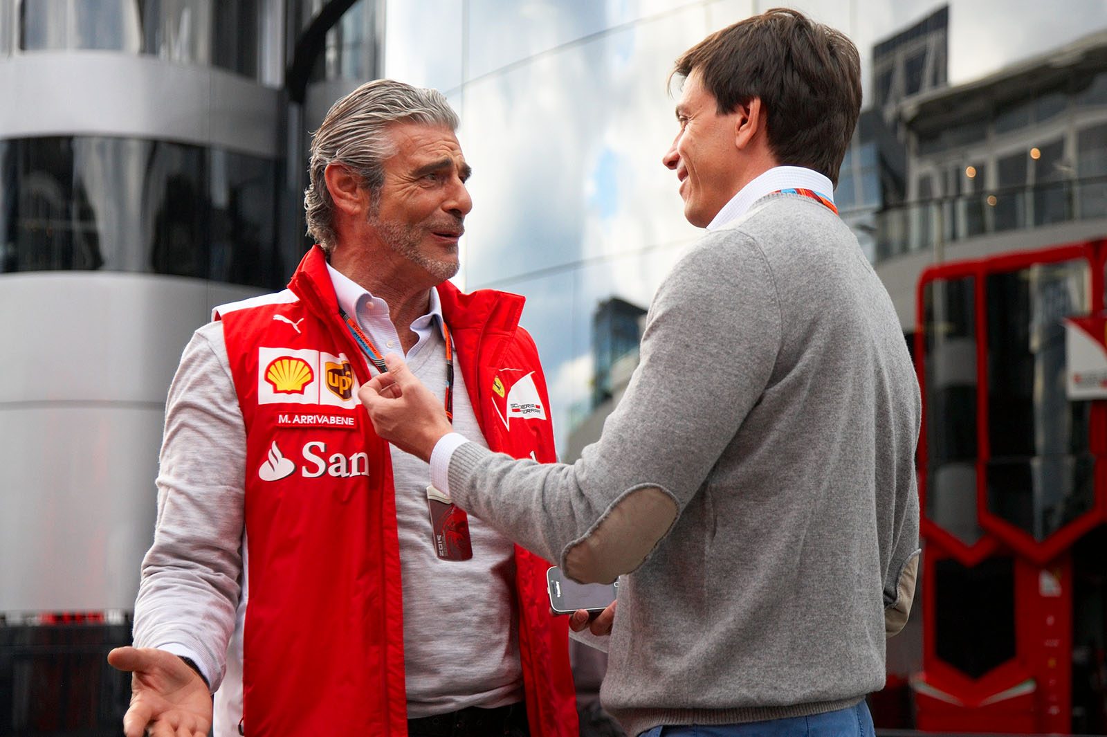 Maurizio Arrivabene, Ferrari, talks to Austrian Toto Wolff, executive director of Mercedes AMG F1 Team, Spielberg, Austrian Grand Prix, 2015